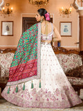Grand Cream Tissue Evening Wear Lehenga Choli With Patola Print Dupatta