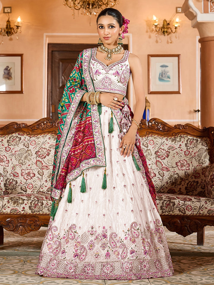 Grand Cream Tissue Evening Wear Lehenga Choli With Patola Print Dupatta