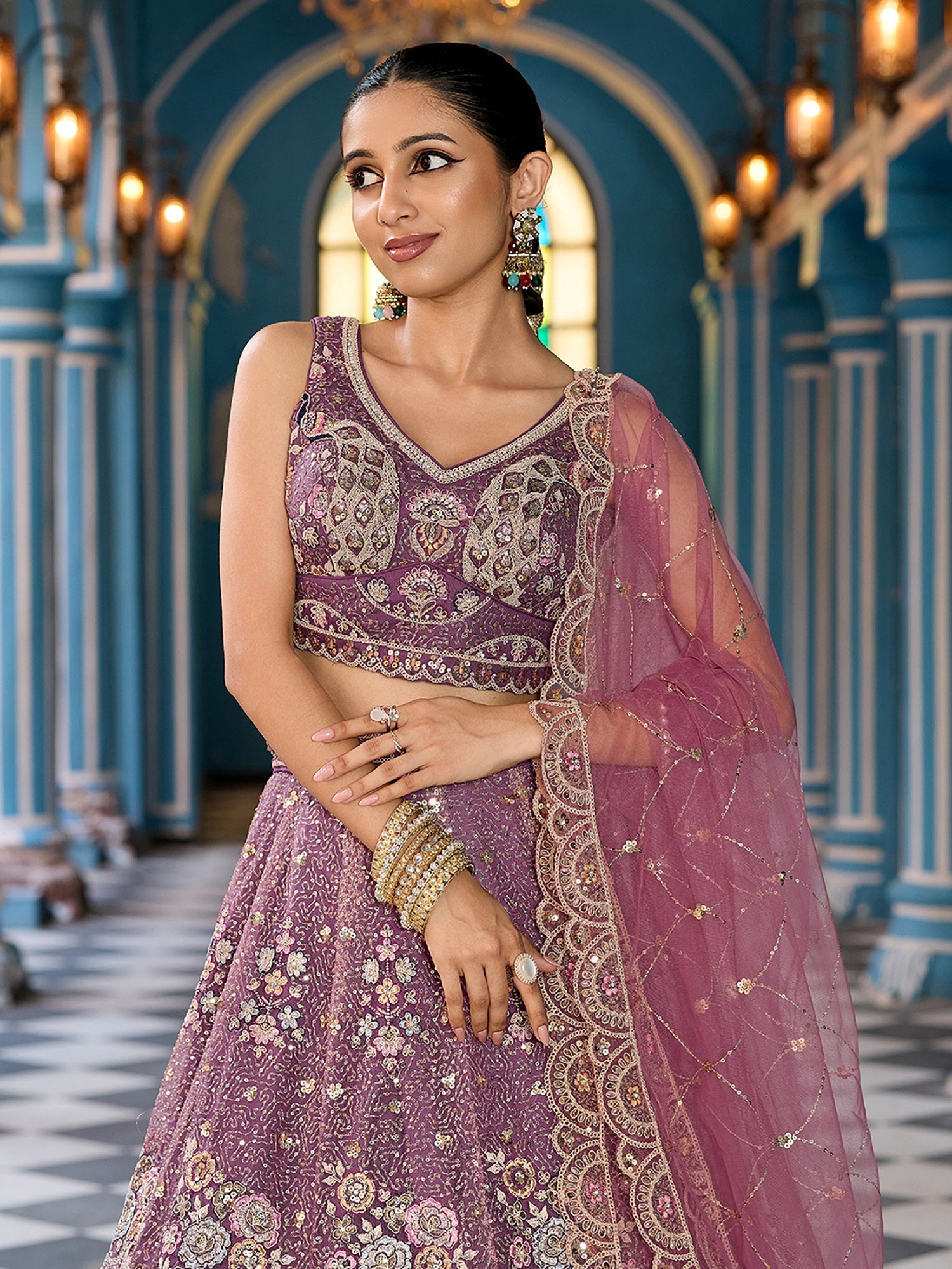 Notable Lavender Net Floral Embroidered Reception Wear Lehenga Choli