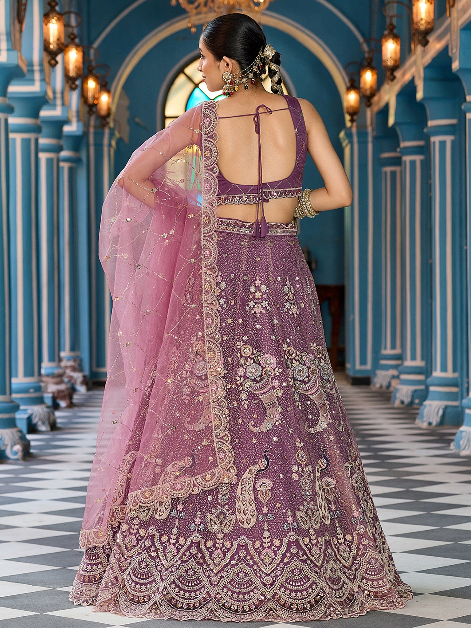 Notable Lavender Net Floral Embroidered Reception Wear Lehenga Choli