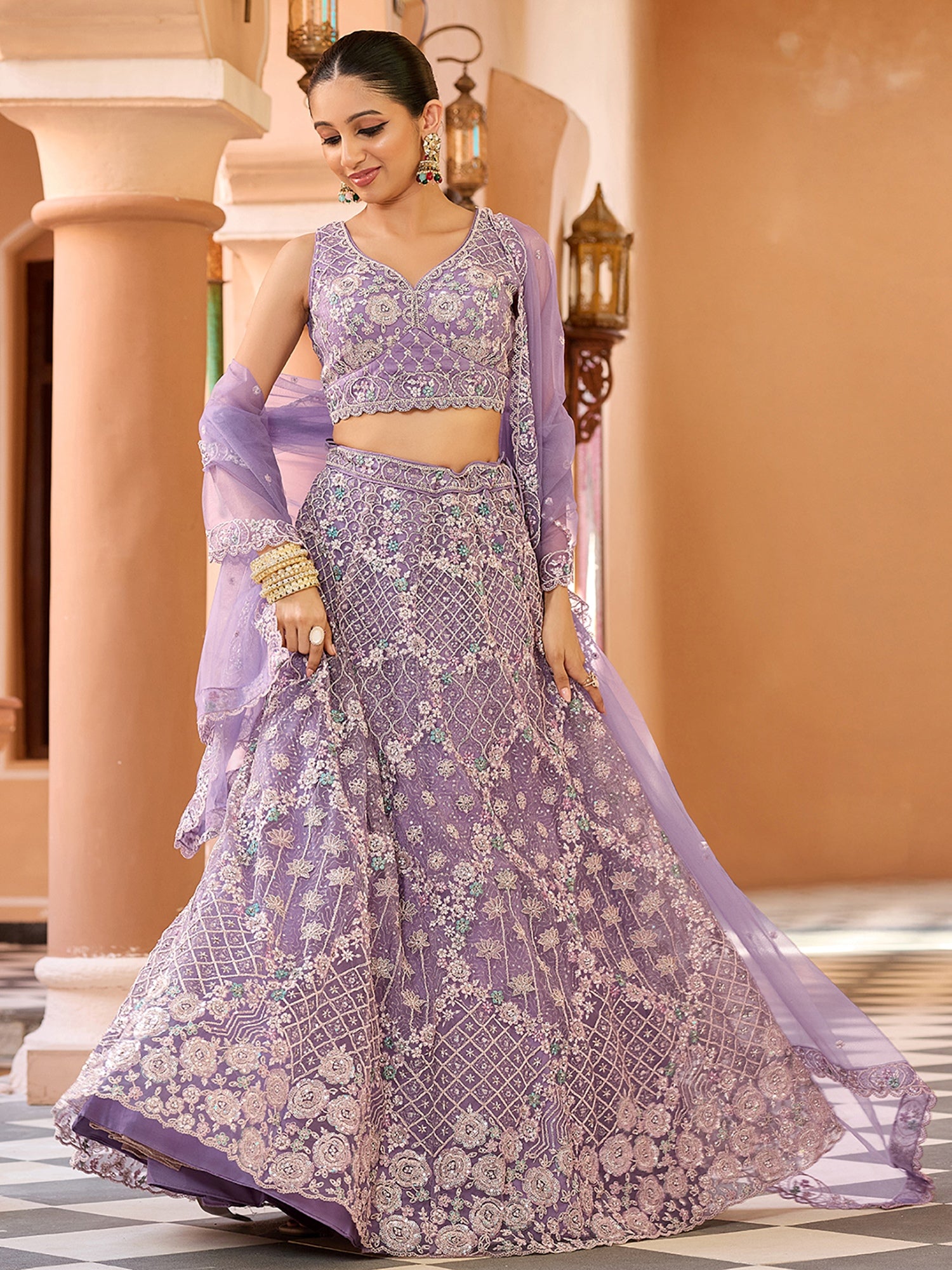 Beautiful Mauve Net Thread Work Reception Wear Lehenga Choli With Dupatta