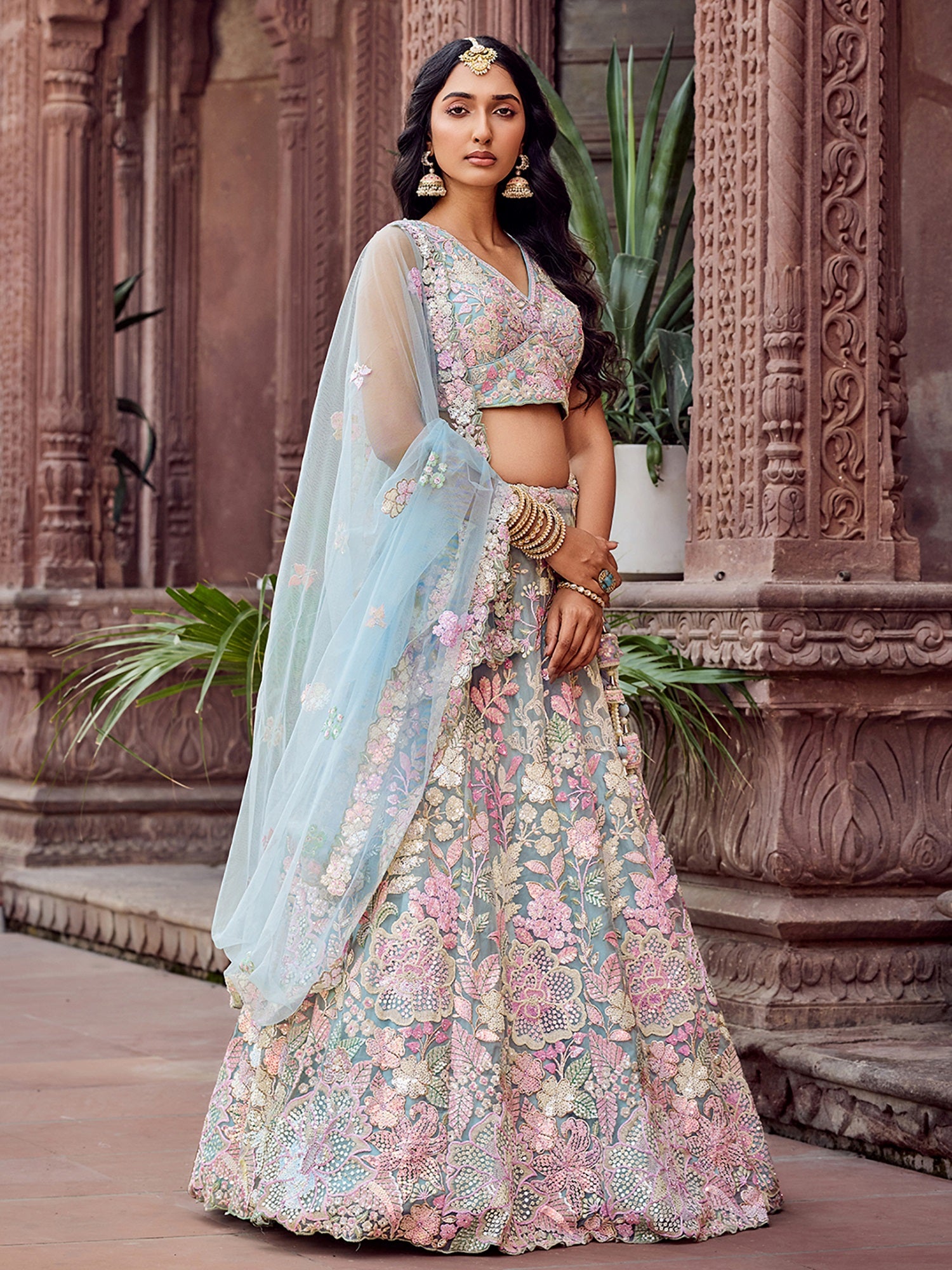 Outstanding Blue Heavy Embroidered Net Engagement Wear Lehenga choli