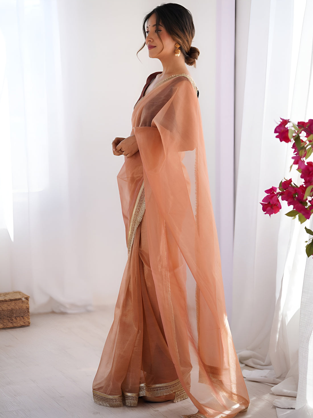 Dazzling Peach Lace Border Net Festive Wear Saree With Blouse