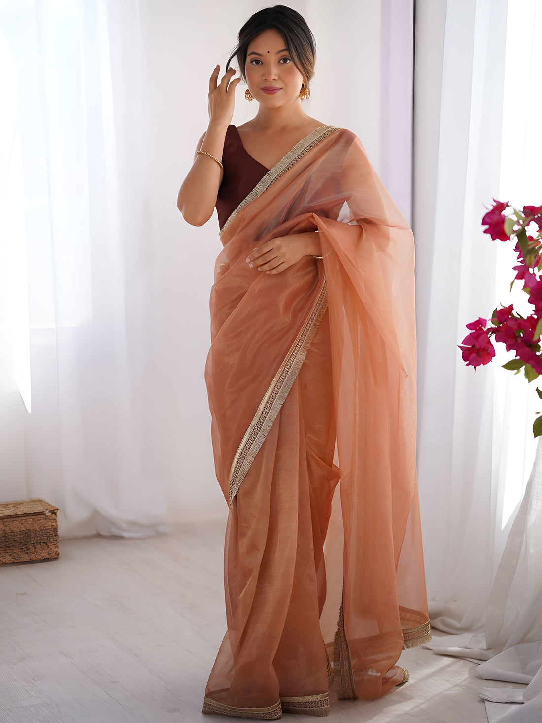 Dazzling Peach Lace Border Net Festive Wear Saree With Blouse