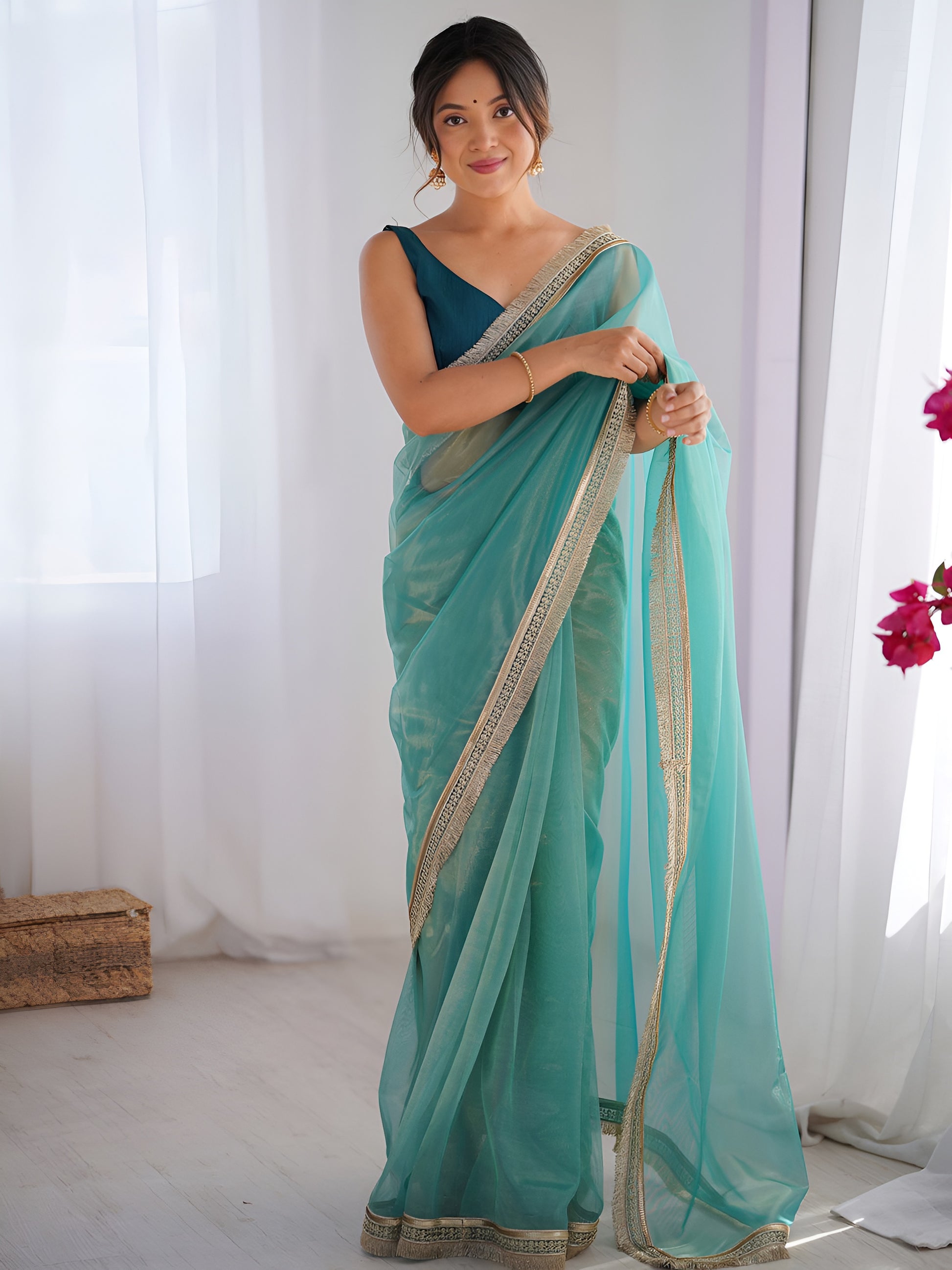 Marvelous Sky Blue Lace Border Net Evening Wear Saree With Blouse