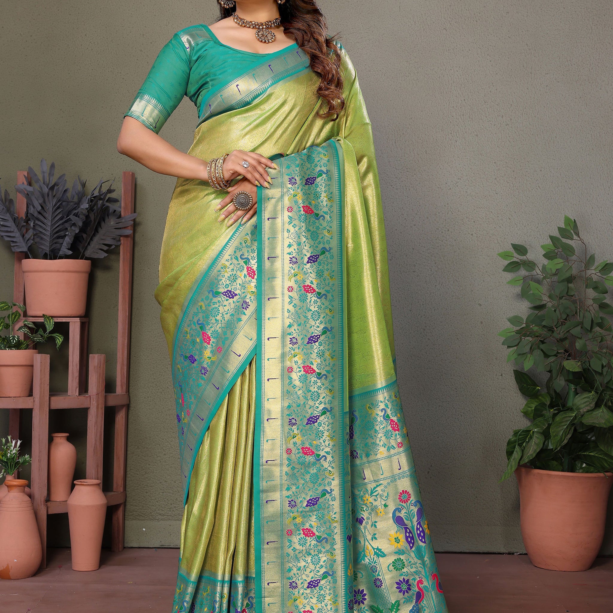 Spectacular Olive Green Zari Weaving Banarasi Silk Traditional Wear Saree