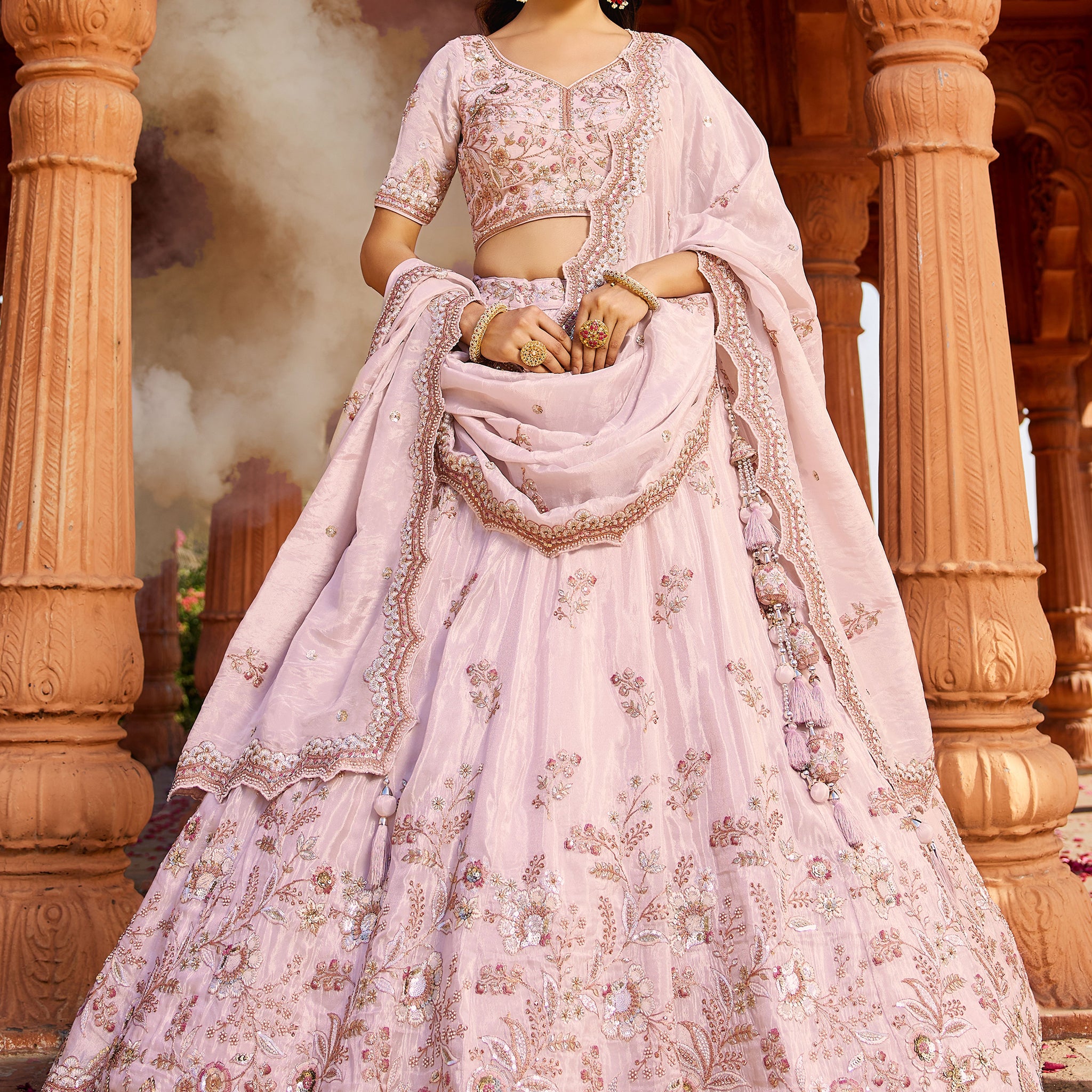 Astonishing Coral Pink Thread Embroidered Tissue Silk Engagement Wear Lehenga Choli