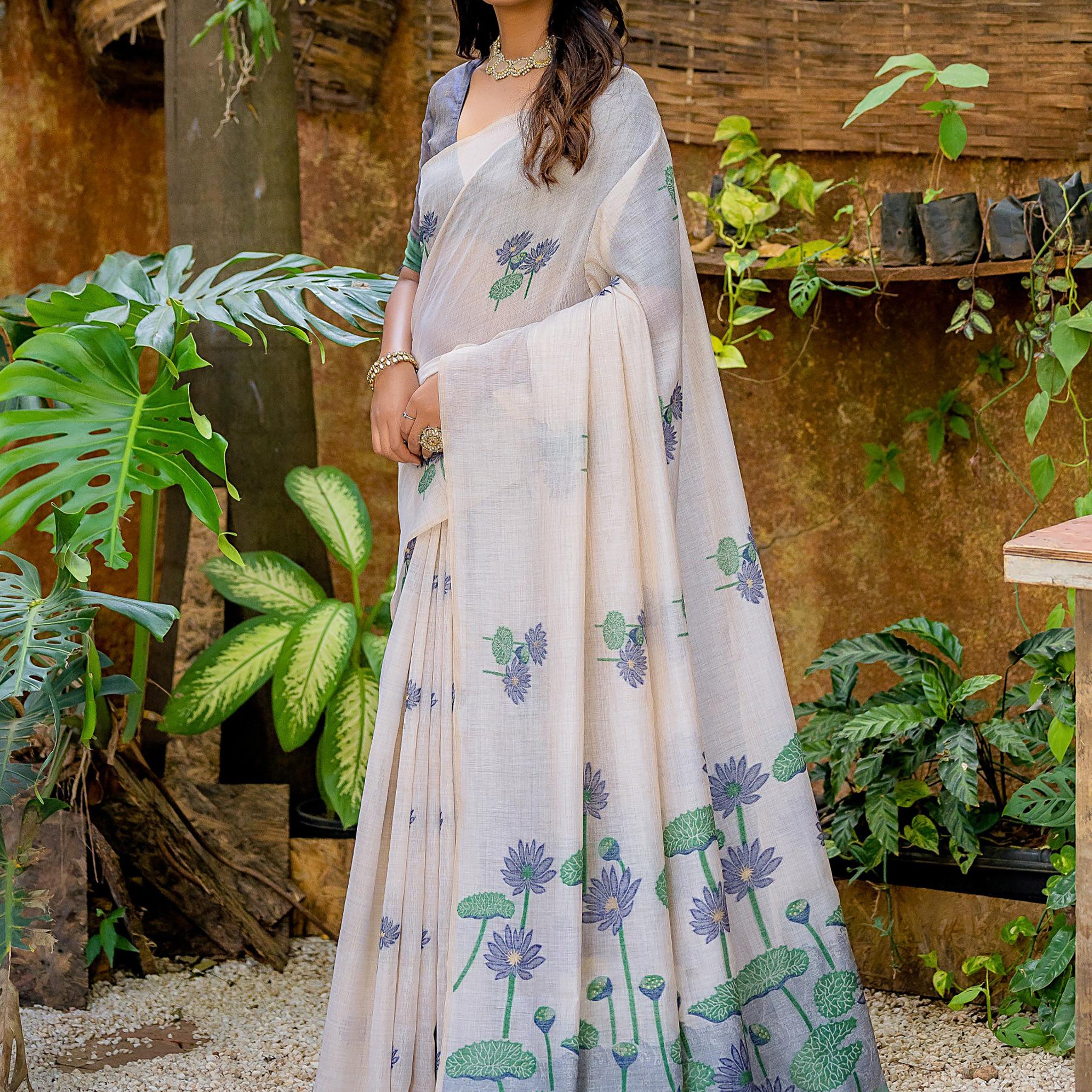 Gorgeous Off-White Floral Weaving Printed Cotton Saree With Blouse