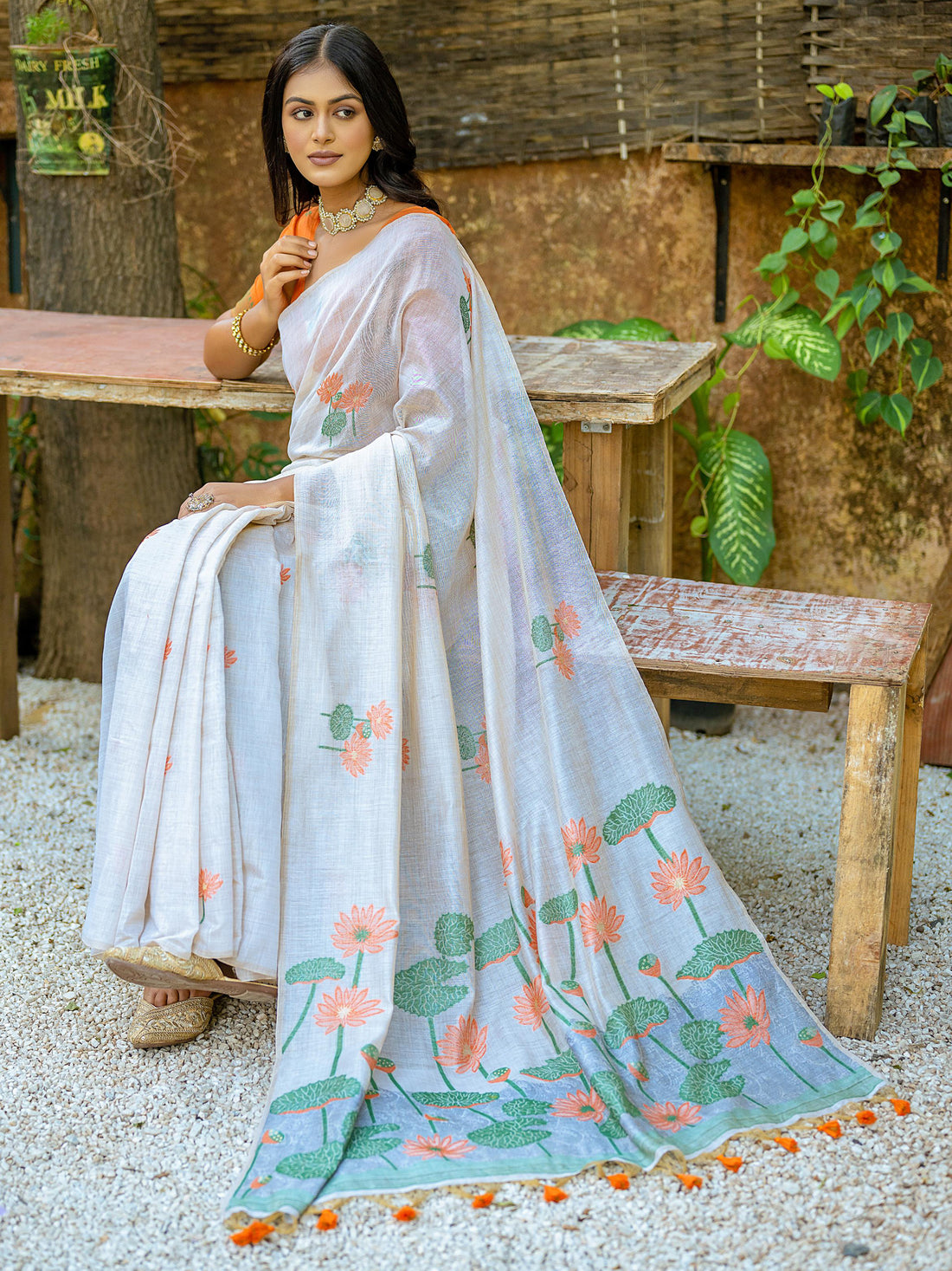 Pretty Off-White Floral Printed Cotton Casual Wear Saree With Orange Blouse