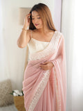 Dazzling Peach Stone Work Georgette Party Wear Saree With Blouse