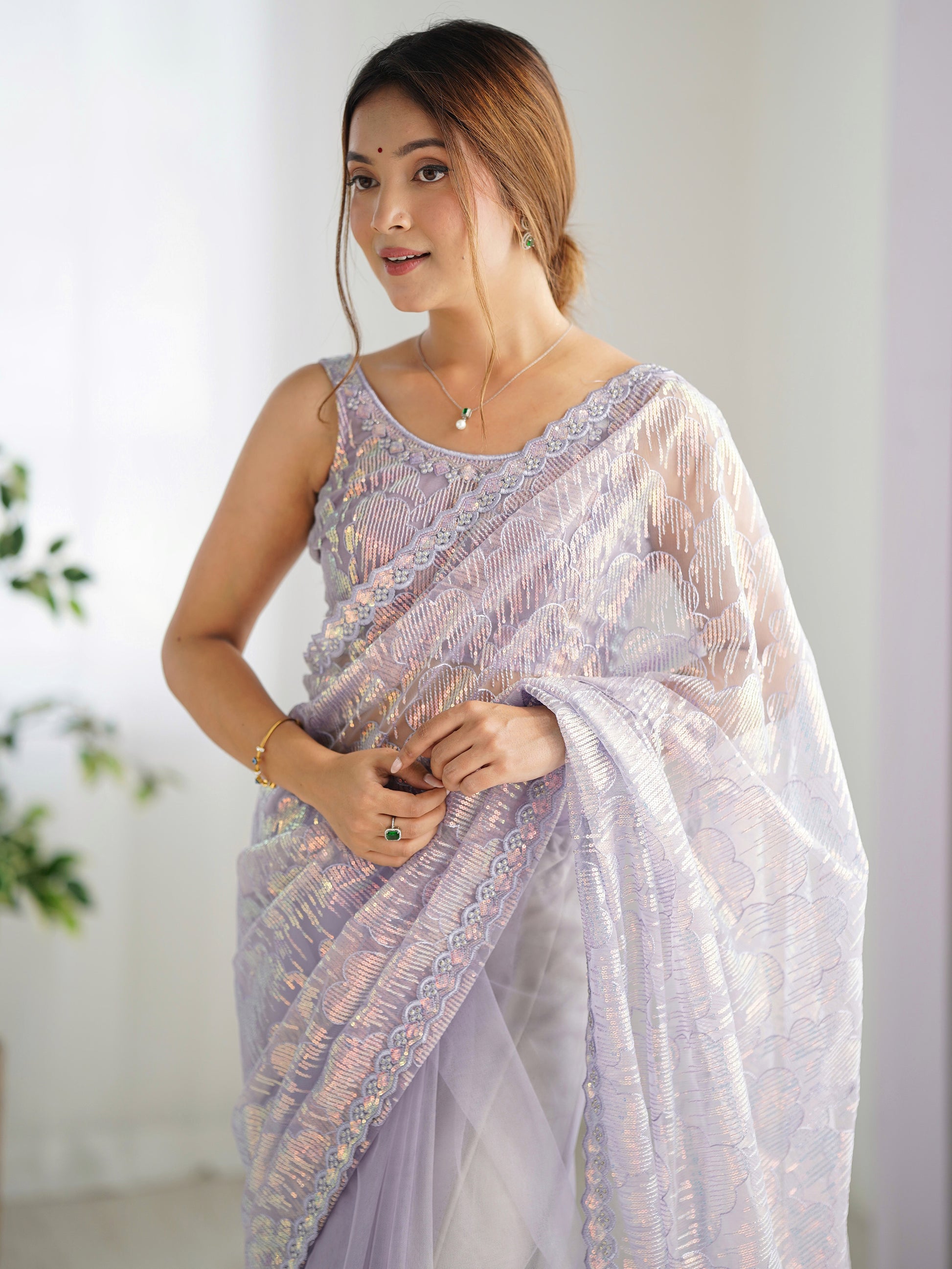Charming Lavender Sequins Net Party Wear Saree With Blouse