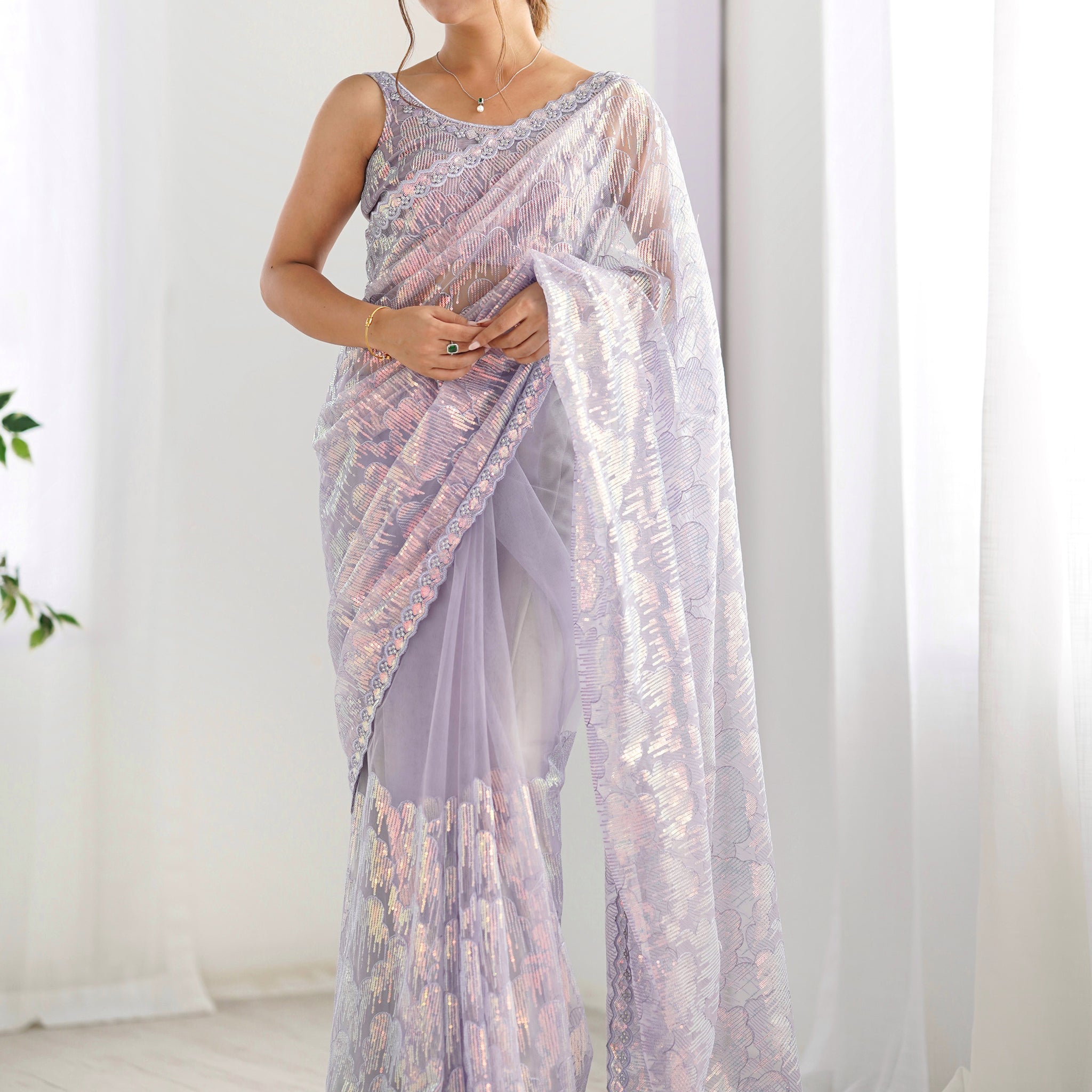 Charming Lavender Sequins Net Party Wear Saree With Blouse