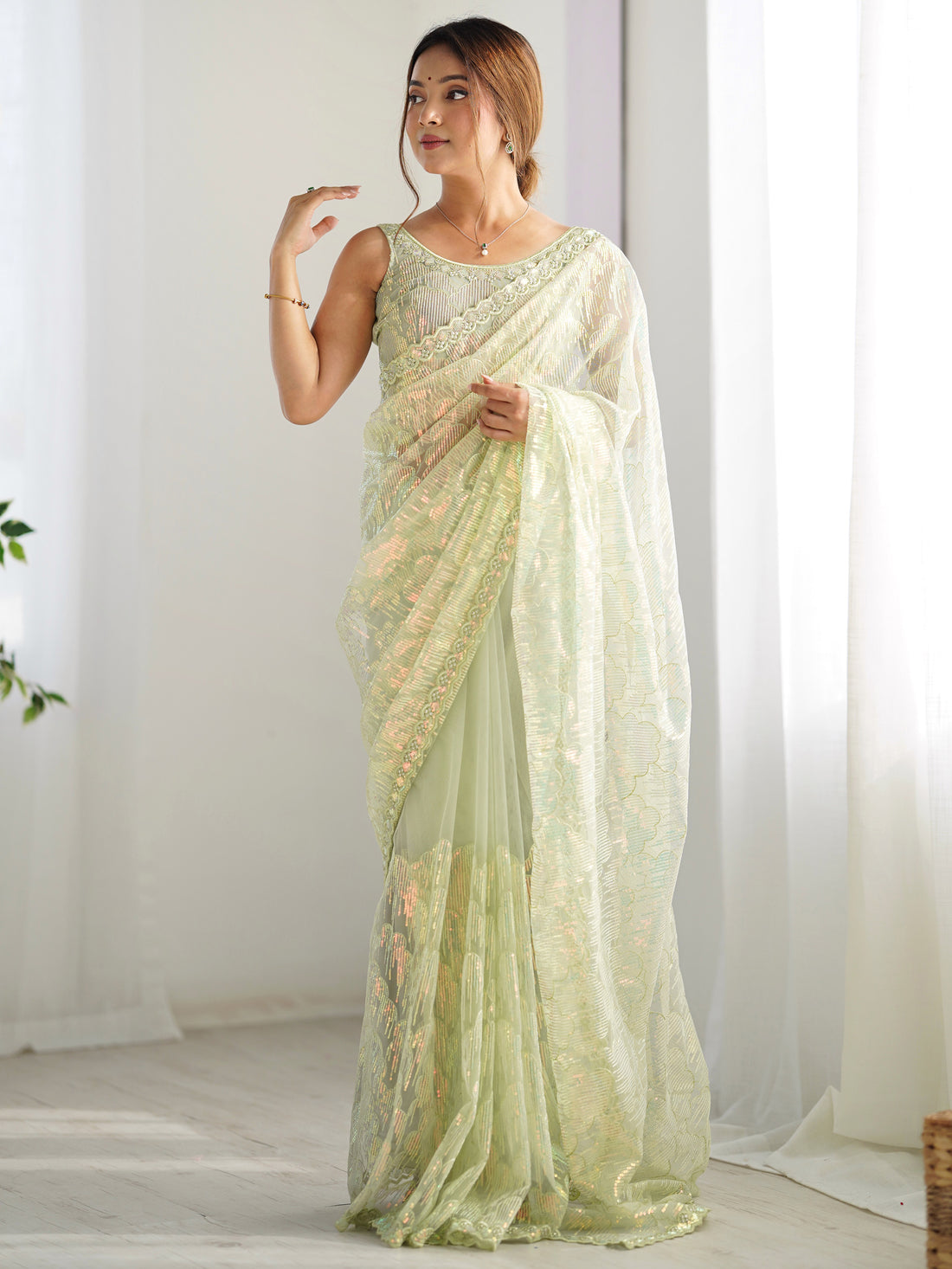Attractive Pista Green Sequins Net Festival Wear Saree With Blouse