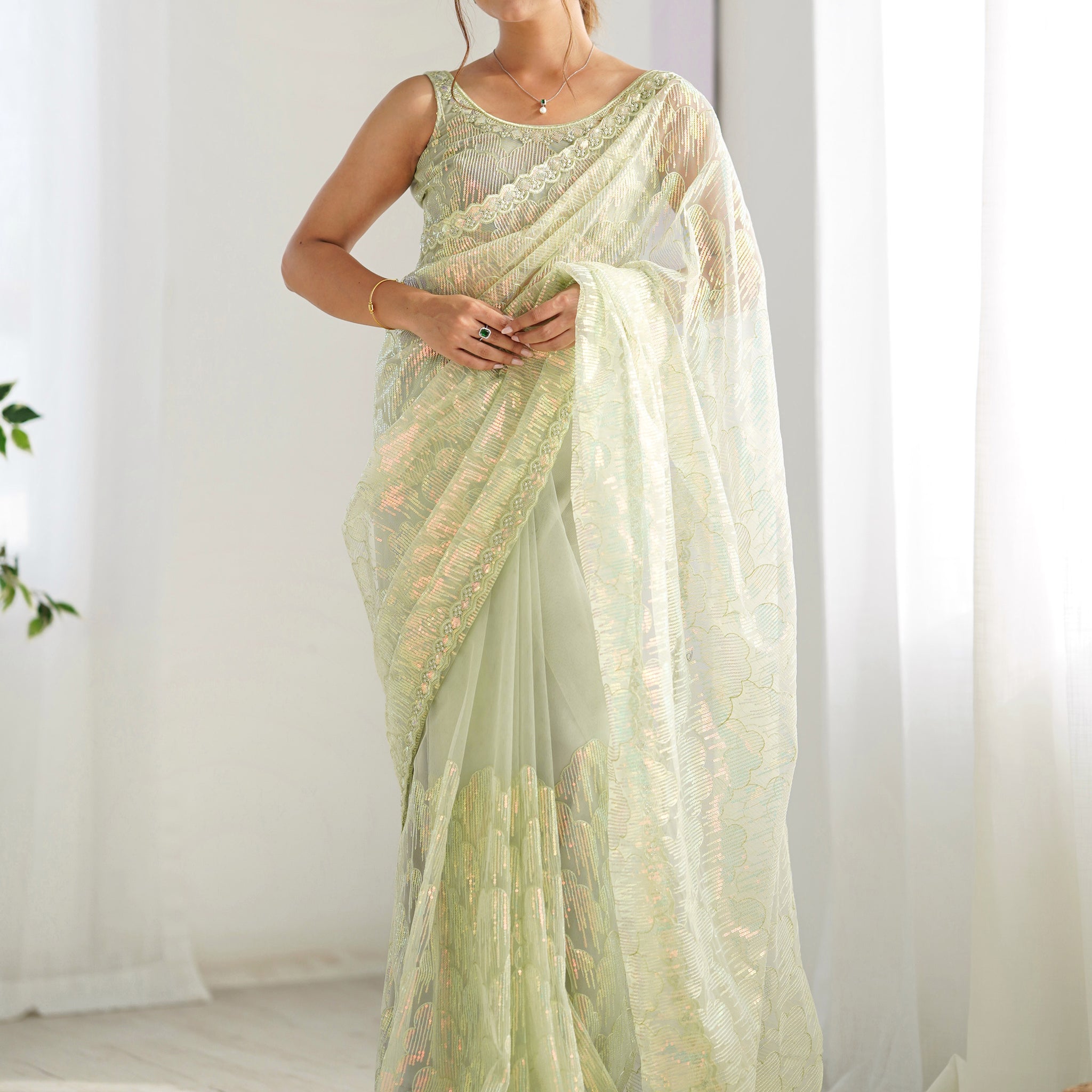 Attractive Pista Green Sequins Net Festival Wear Saree With Blouse
