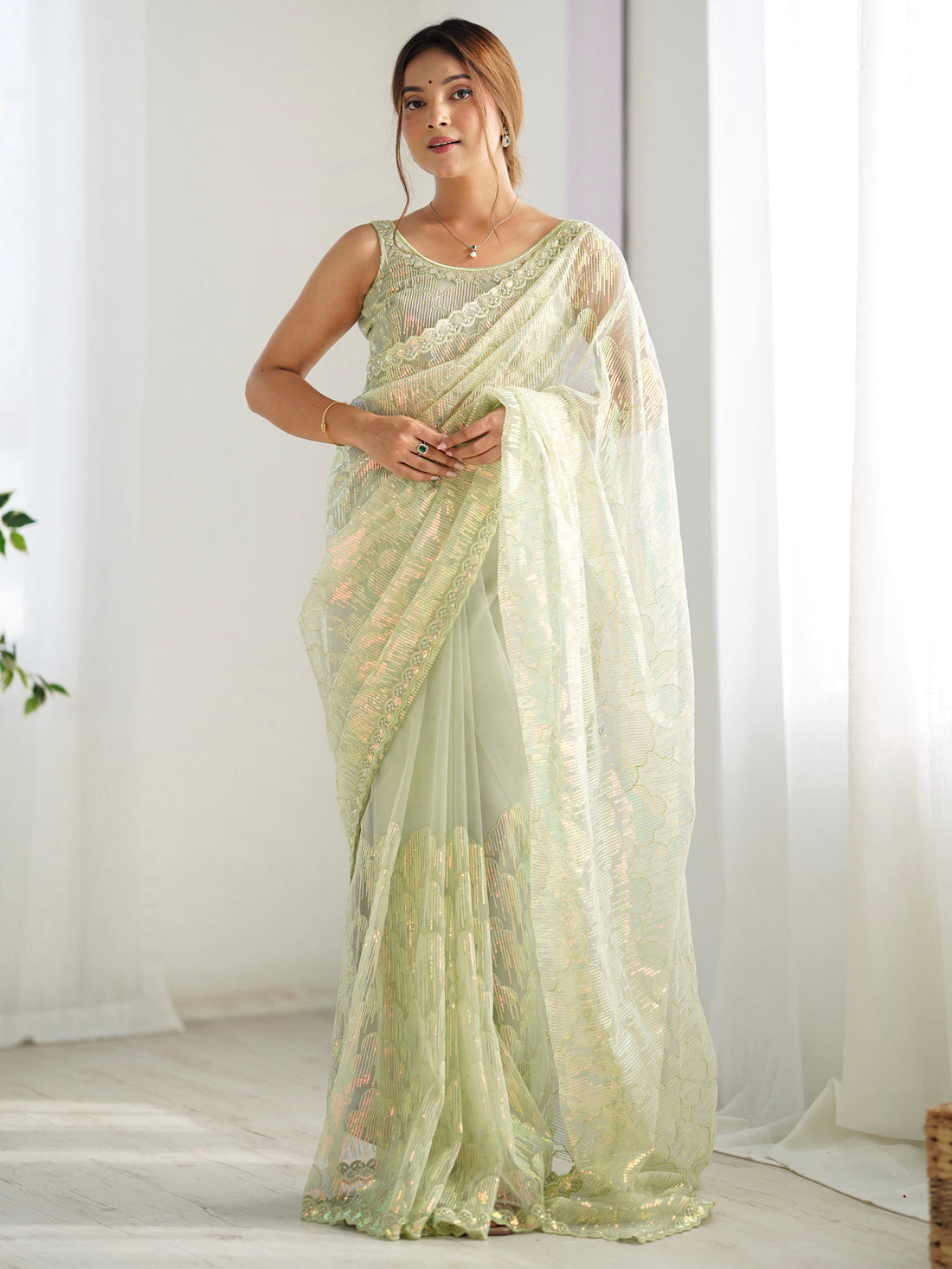 Attractive Pista Green Sequins Net Festival Wear Saree With Blouse