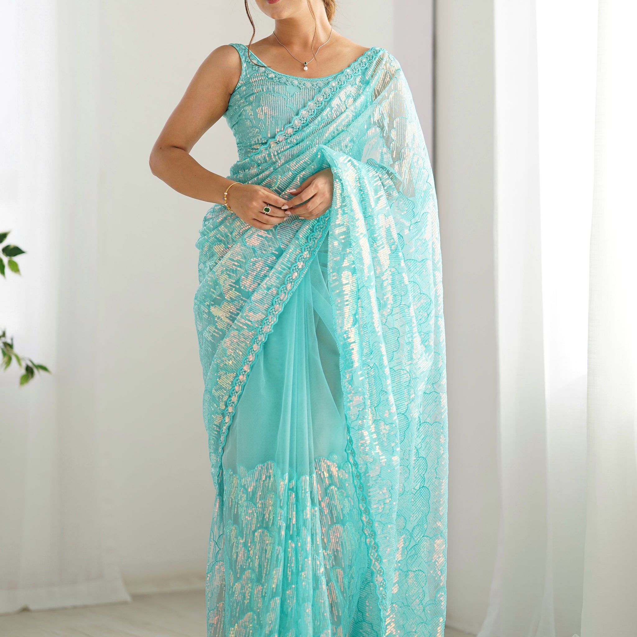 Mesmerizing Sky-Blue Sequins Net Event Wear Saree With Blouse
