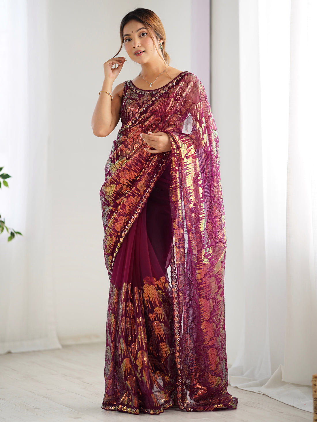 Bewitching Wine Sequins Net Reception Wear Saree With Blouse