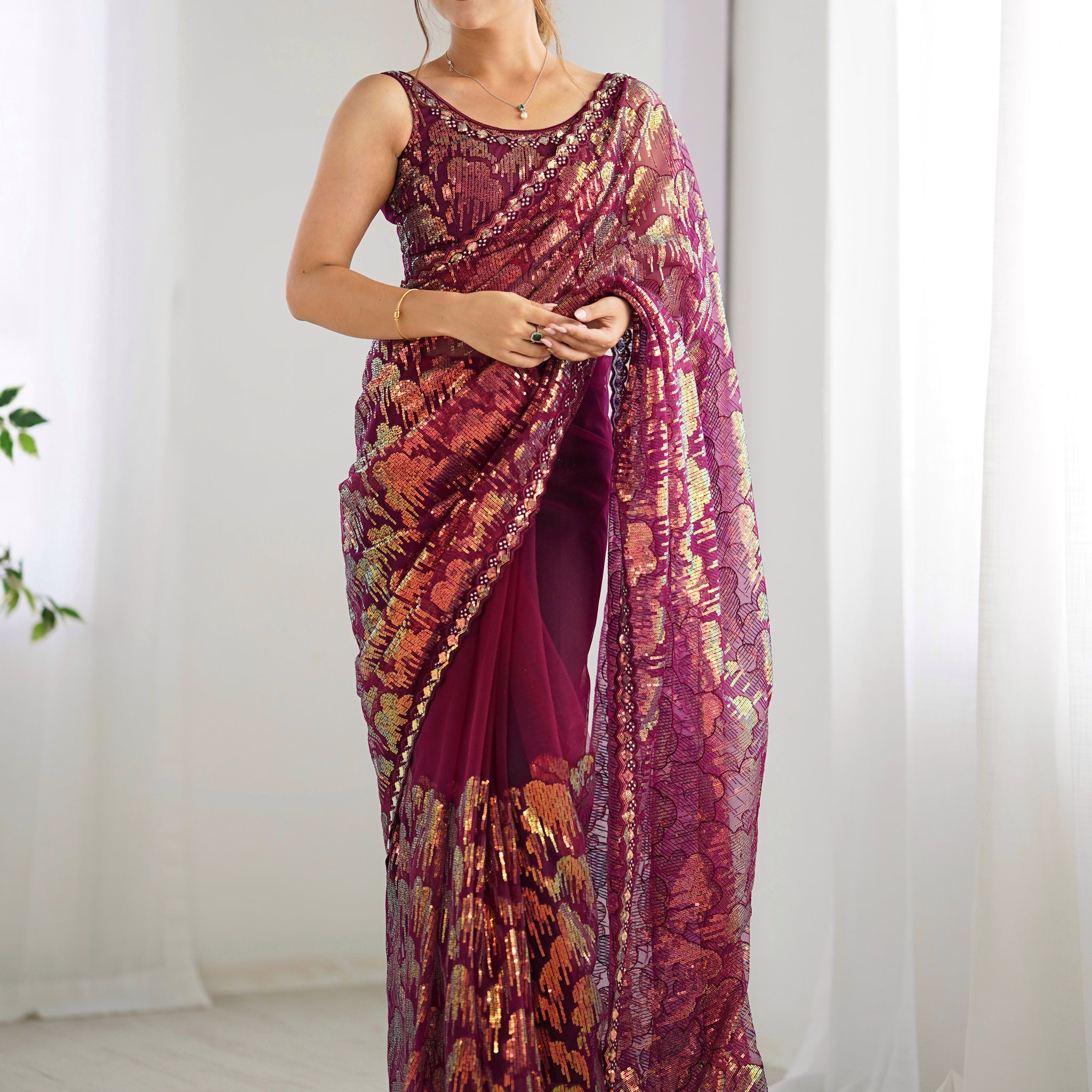 Bewitching Wine Sequins Net Reception Wear Saree With Blouse