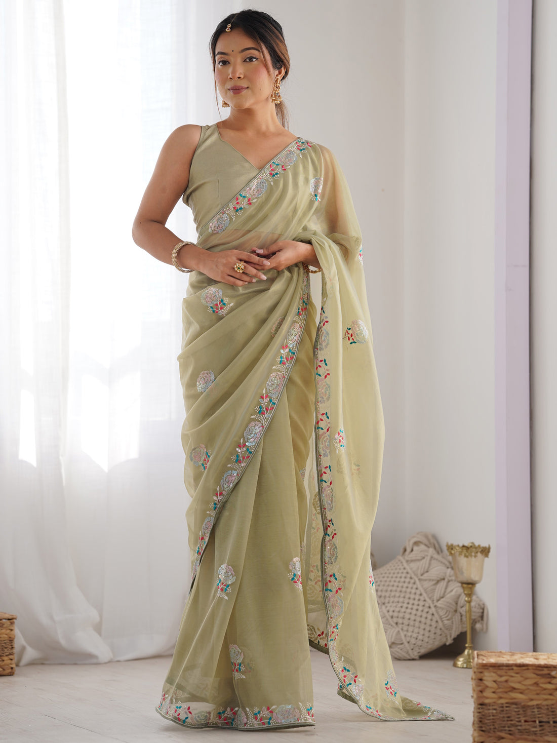 Spectacular Pista Green Sequins Net Festival Wear Saree With Blouse