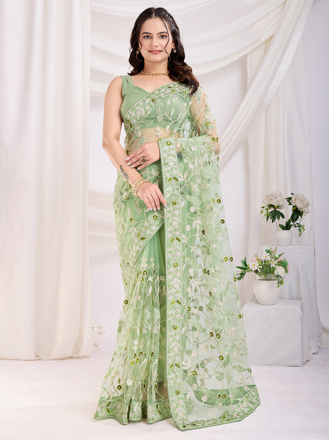 Spectacular Pista Green Thread Embroidery Net Festive Wear Saree