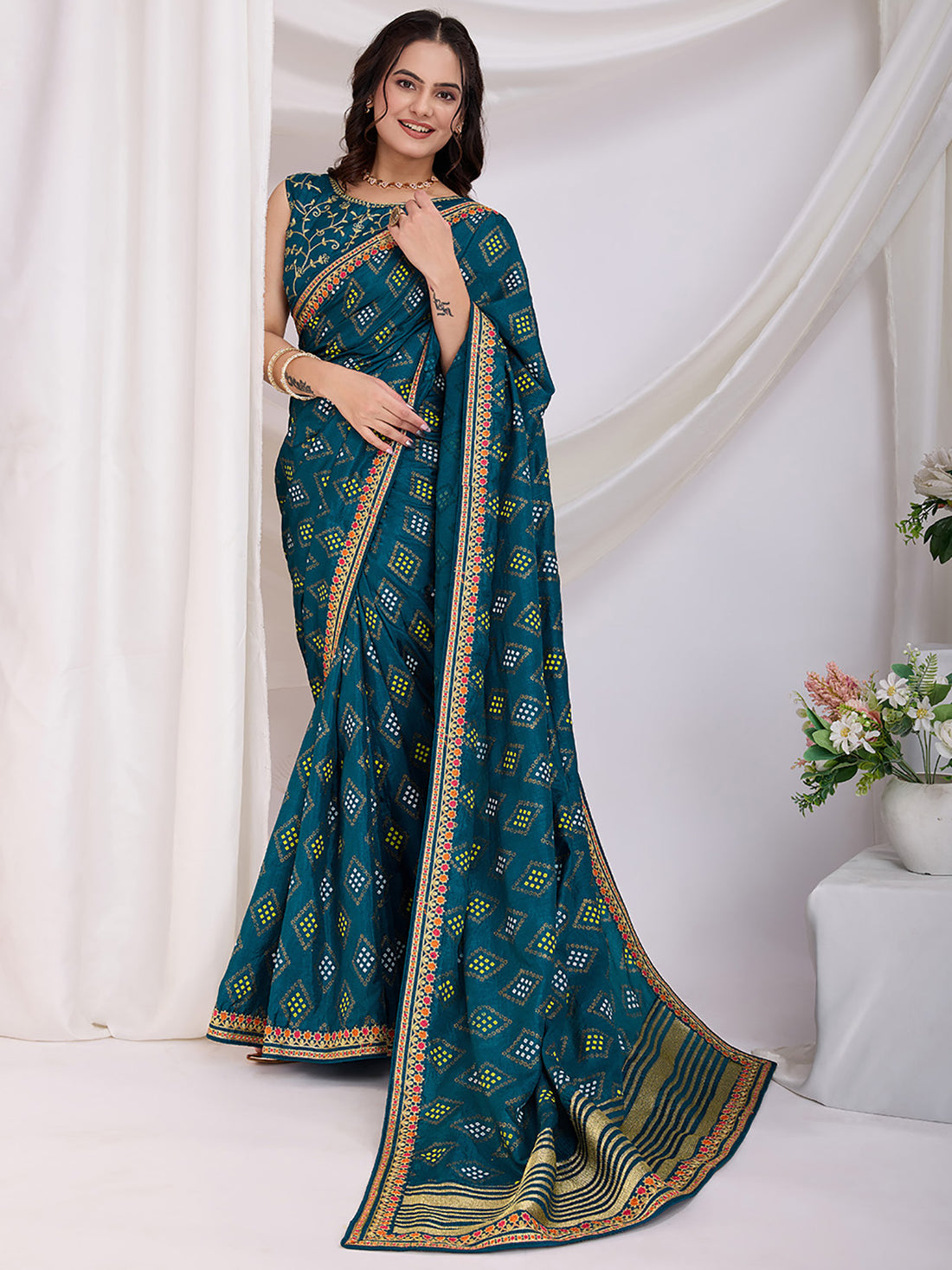 Alluring Teal Blue Bandhej Printed Silk Festive Wear Saree