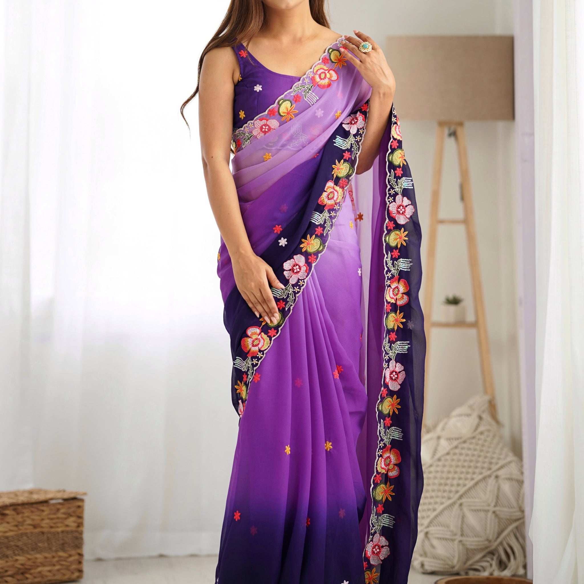 Amazing Purple Thread Embroidered Georgette Casual Wear Saree
