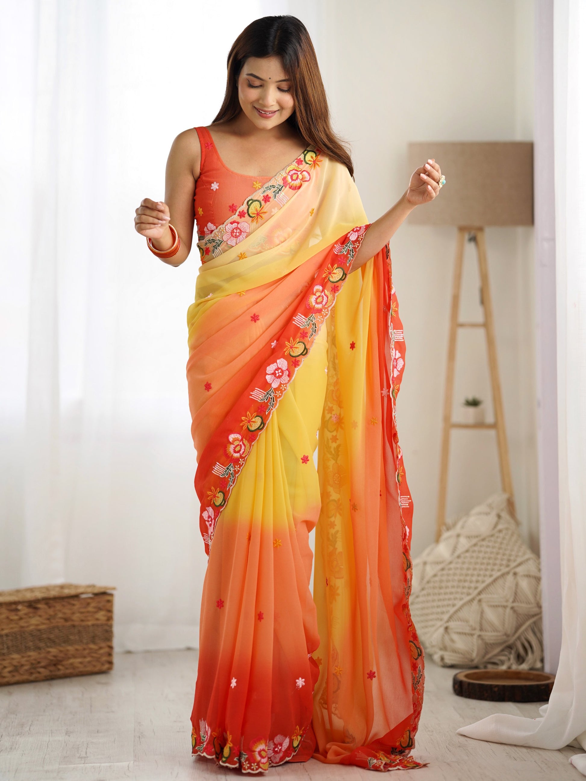 Wonderful Yellow Floral Embroidered Georgette Party Wear Saree