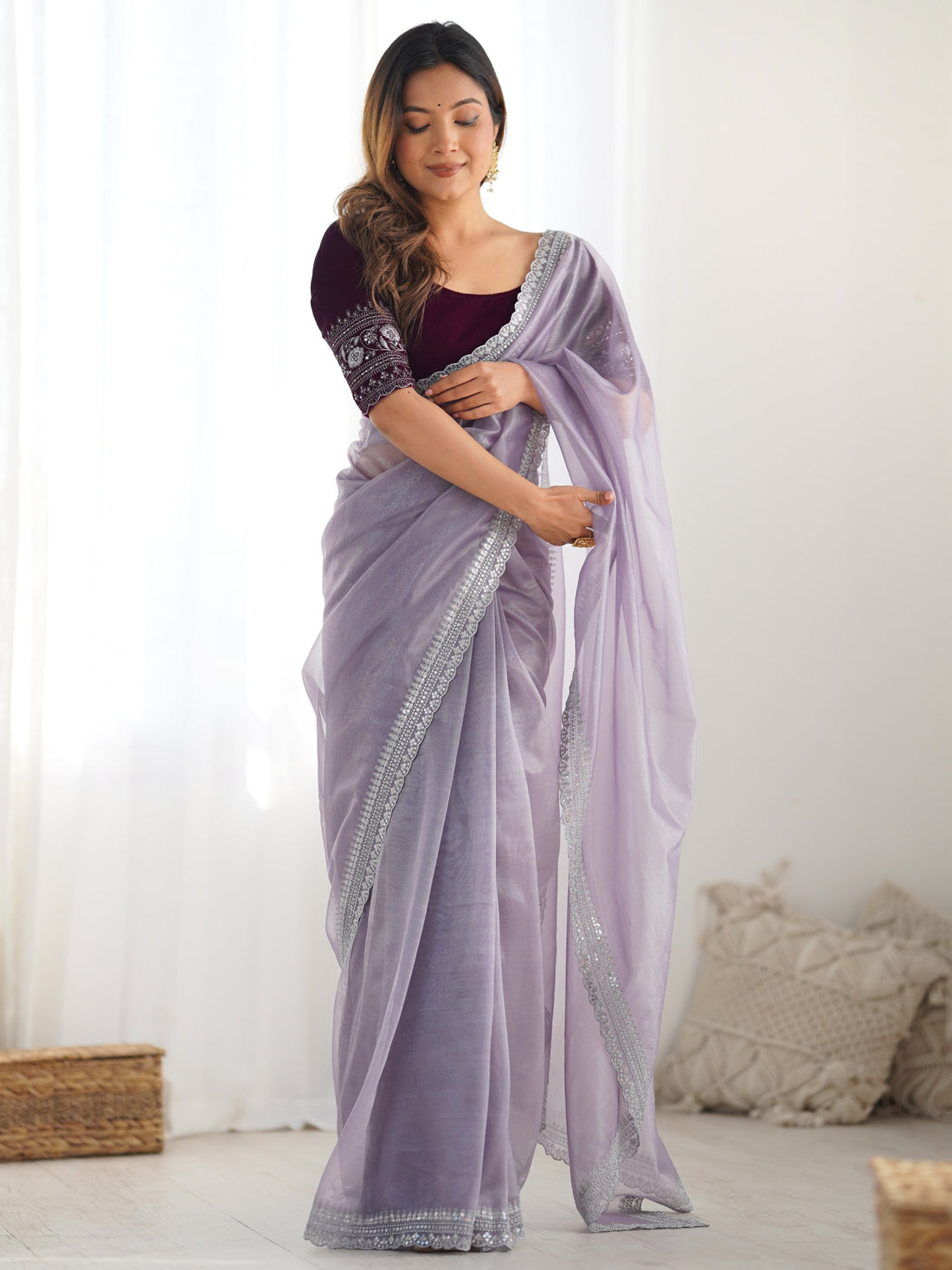 Stunning Lavender Sequins Border Work Net Saree With Blouse
