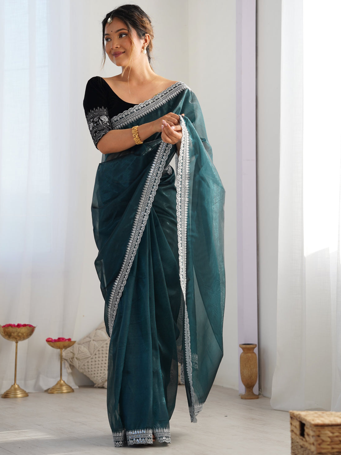 Tantalizing Teal Green Border Work Net Event Wear Saree With Blouse
