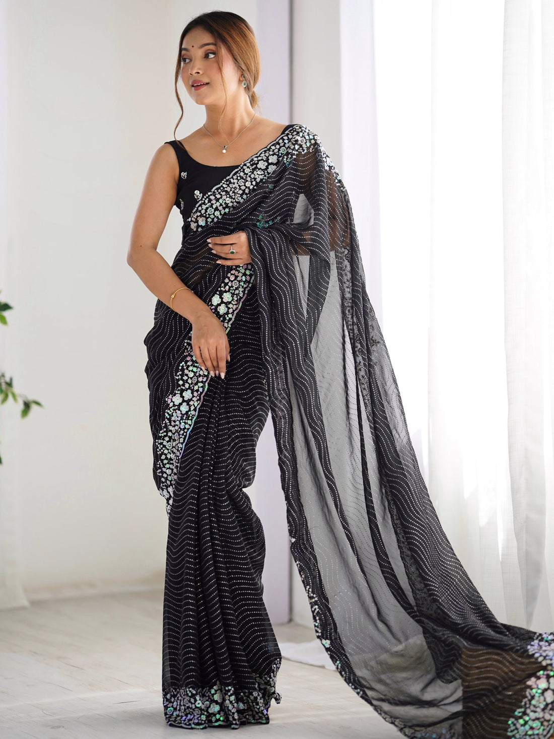 Eye-Catching Black Sequins Georgette Party Wear Saree With Blouse