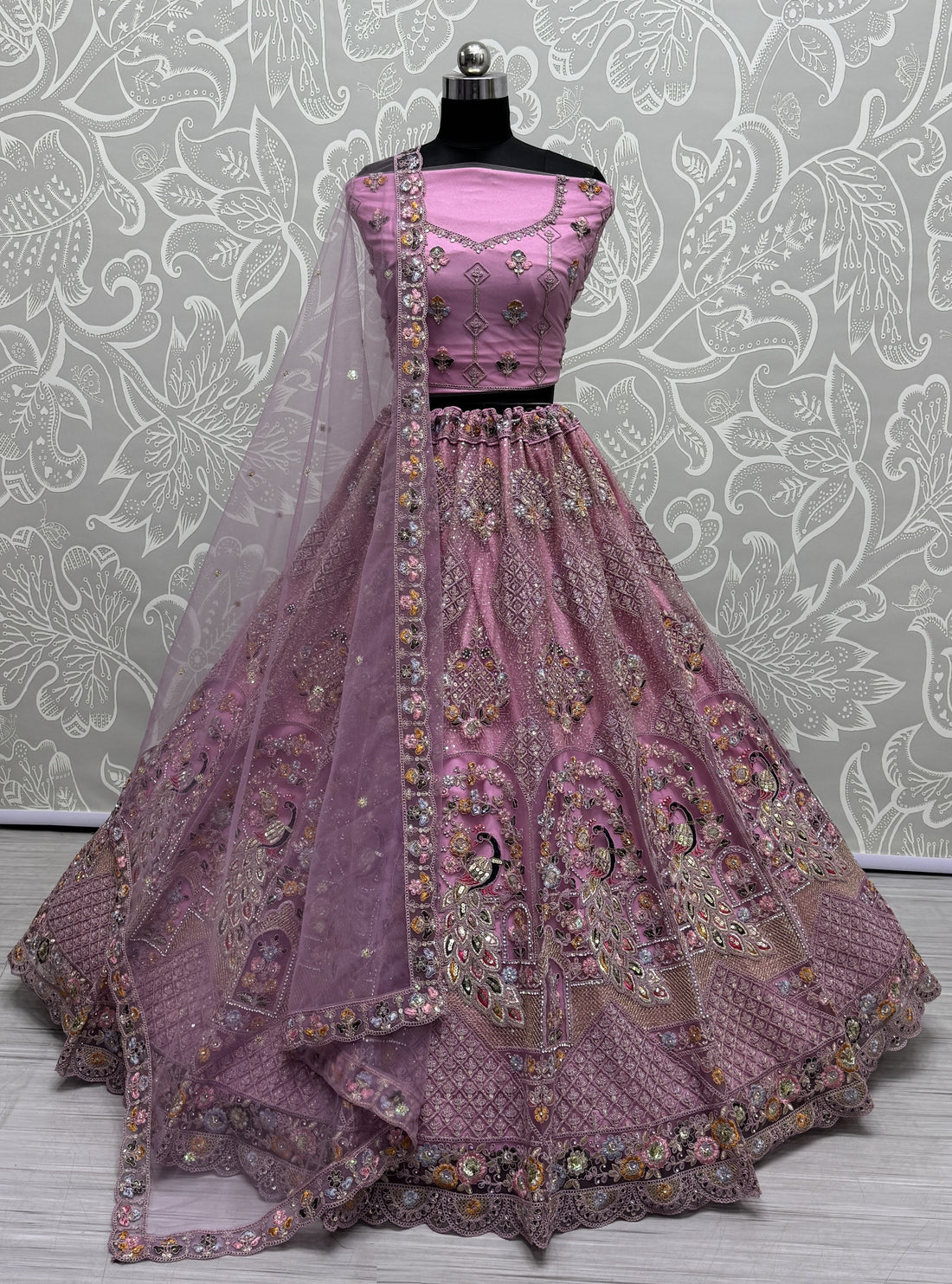Fabulous Pink Sequins Work Net Wedding Wear Lehenga Choli With Dupatta