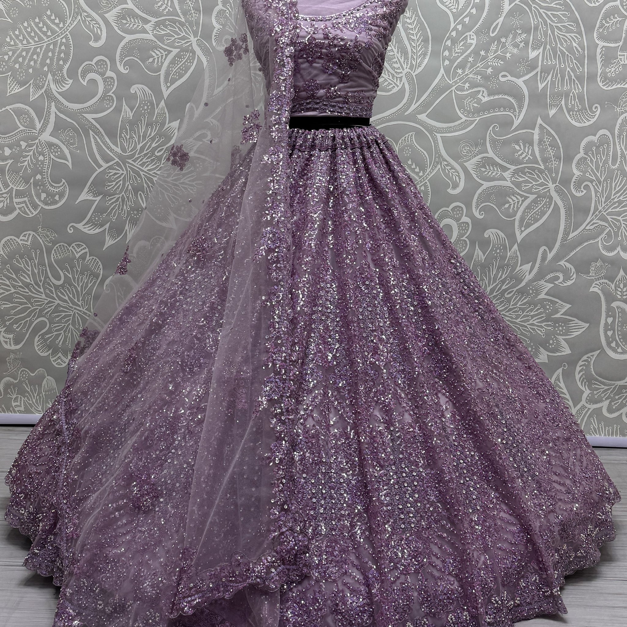 Amazing Purple Sequins Heavy Net Wedding Wear Lehenga Choli