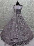 Adorable Lavender Sequins Work Net Bridesmaid Lehenga Choli With Dupatta