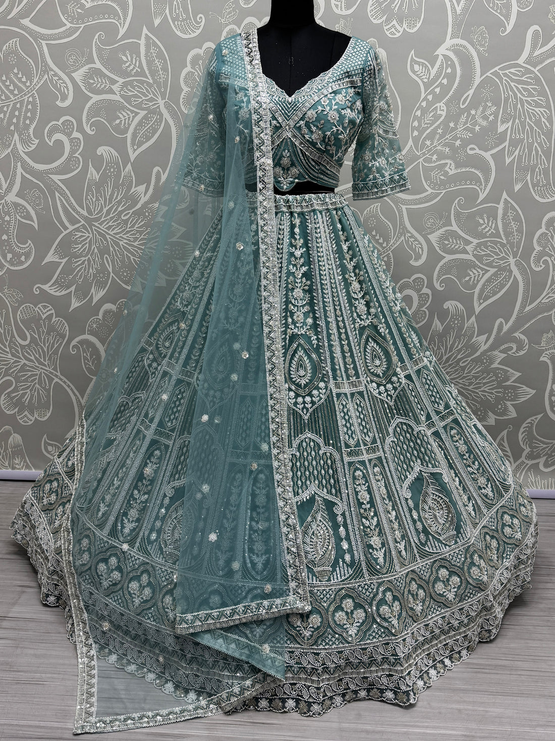 Enchanting Sky-Blue Sequins Net Reception Wear Lehenga Choli