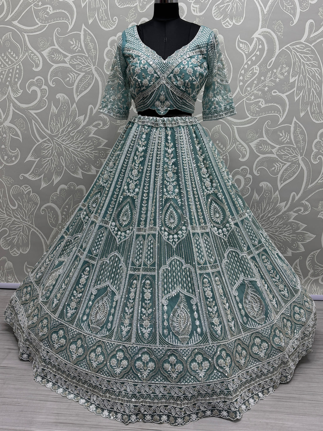 Enchanting Sky-Blue Sequins Net Reception Wear Lehenga Choli