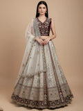 Great Off-White Stone Work Net Wedding Wear Lehenga Choli With Dupatta