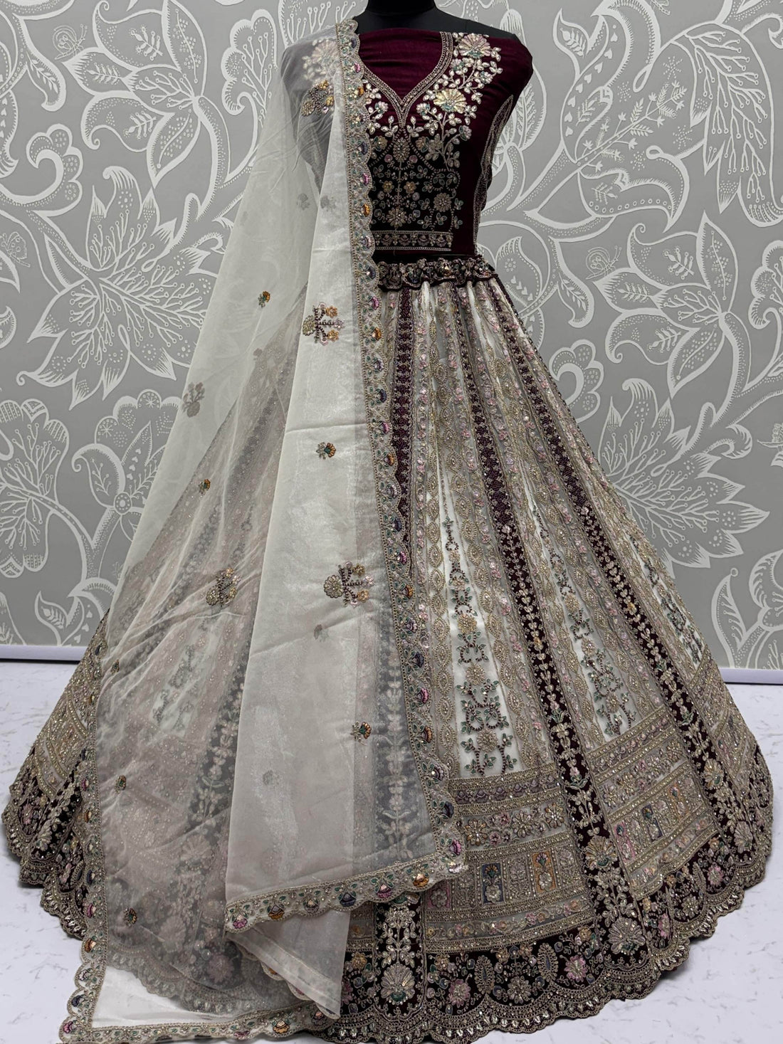 Great Off-White Stone Work Net Wedding Wear Lehenga Choli With Dupatta