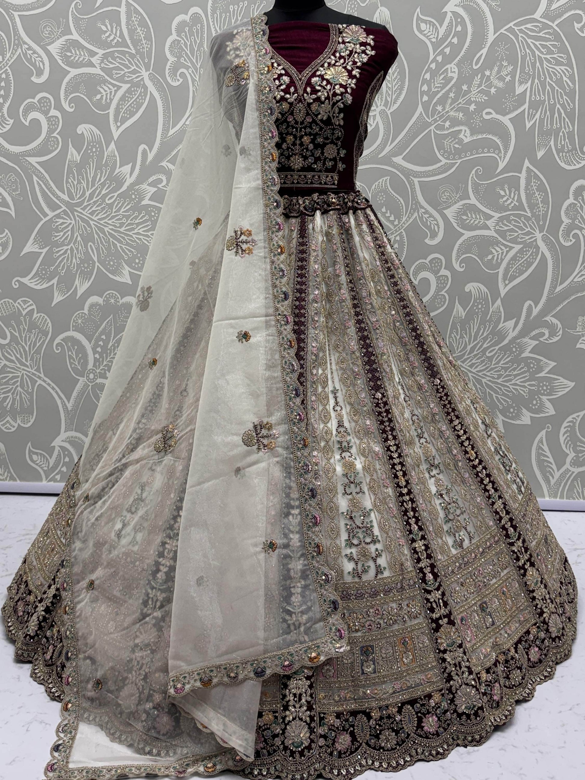Great Off-White Stone Work Net Wedding Wear Lehenga Choli With Dupatta