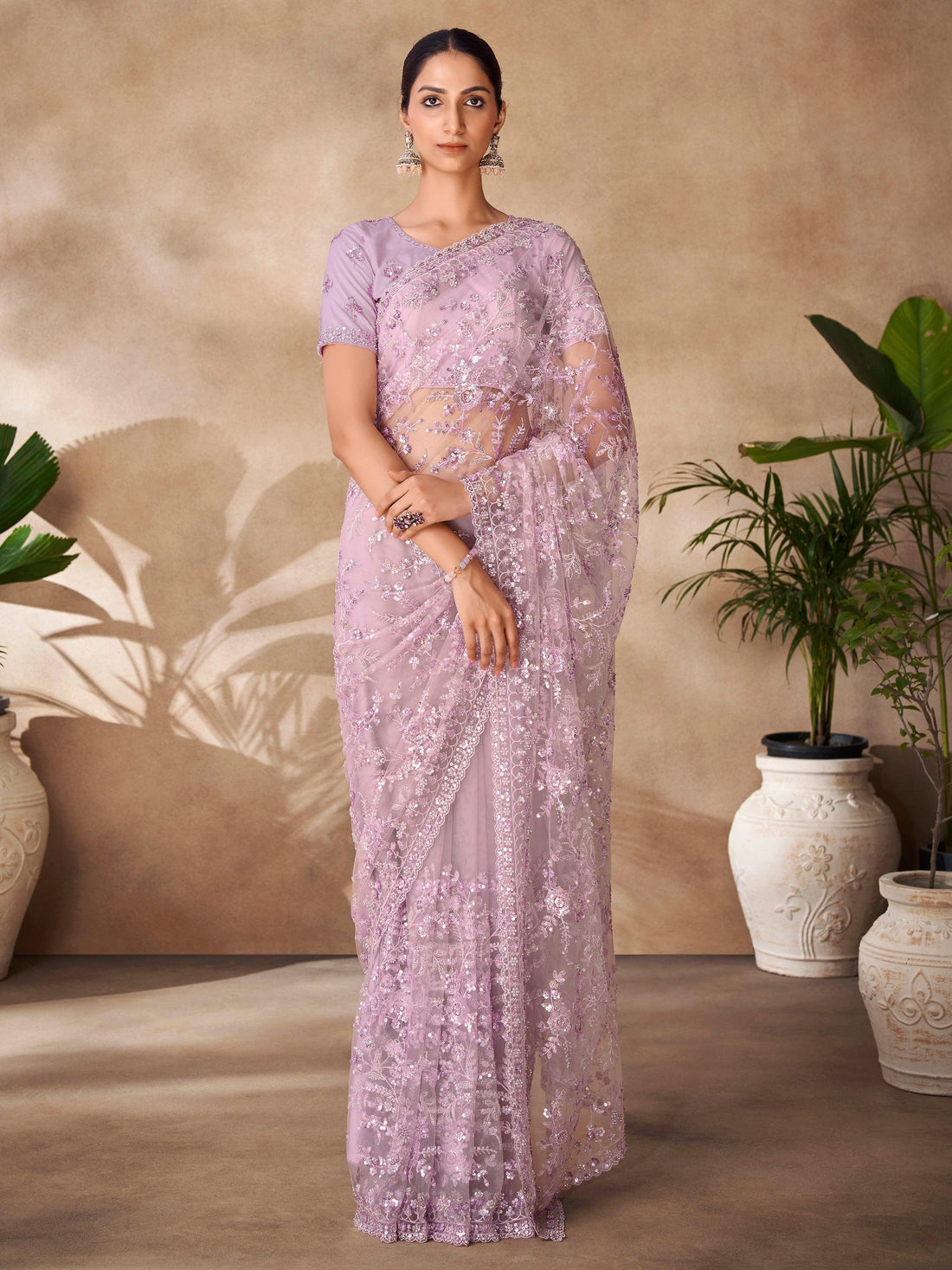 Captivating Lavender Sequins Net Party Wear Saree With Blouse