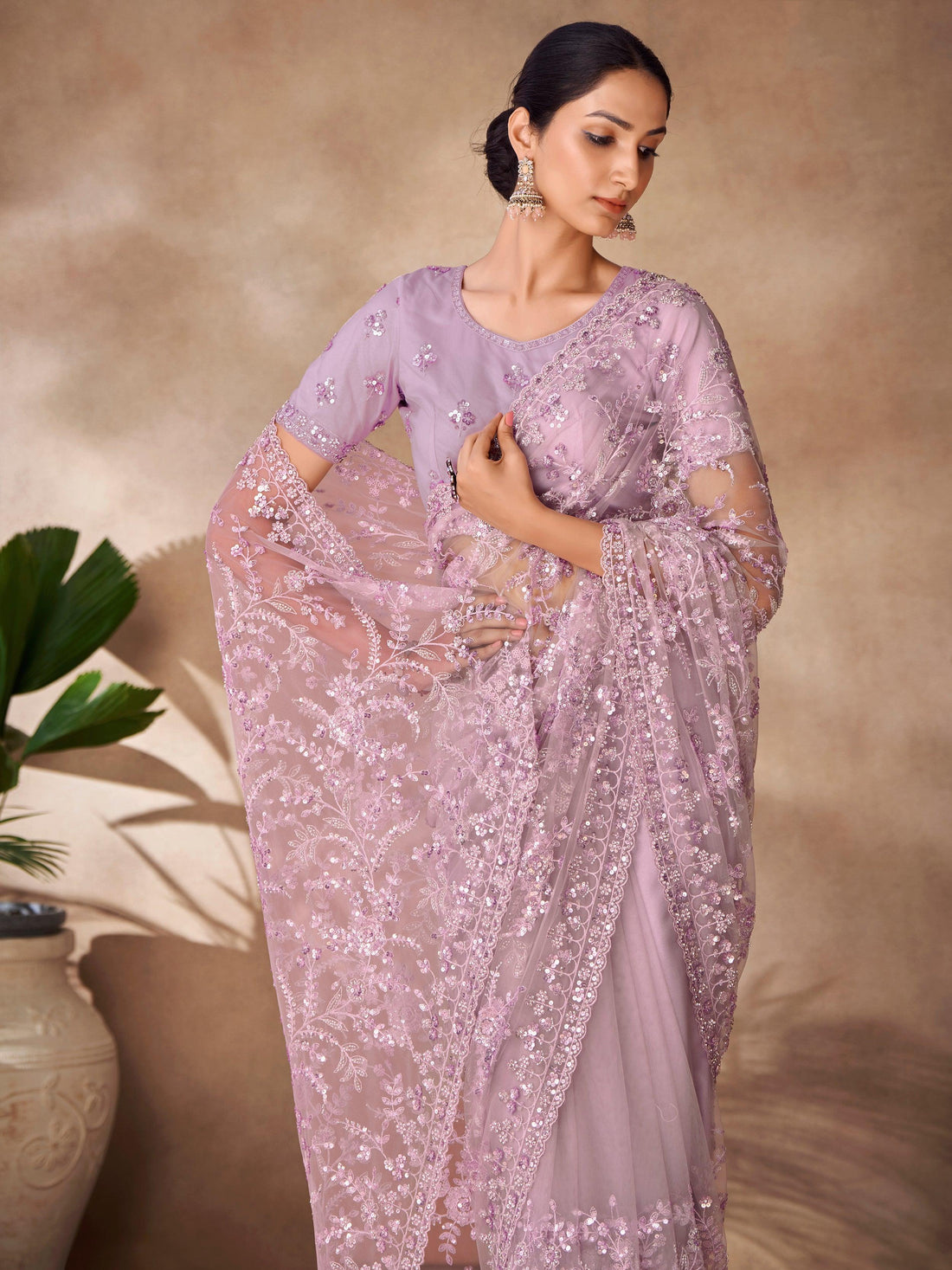Captivating Lavender Sequins Net Party Wear Saree With Blouse