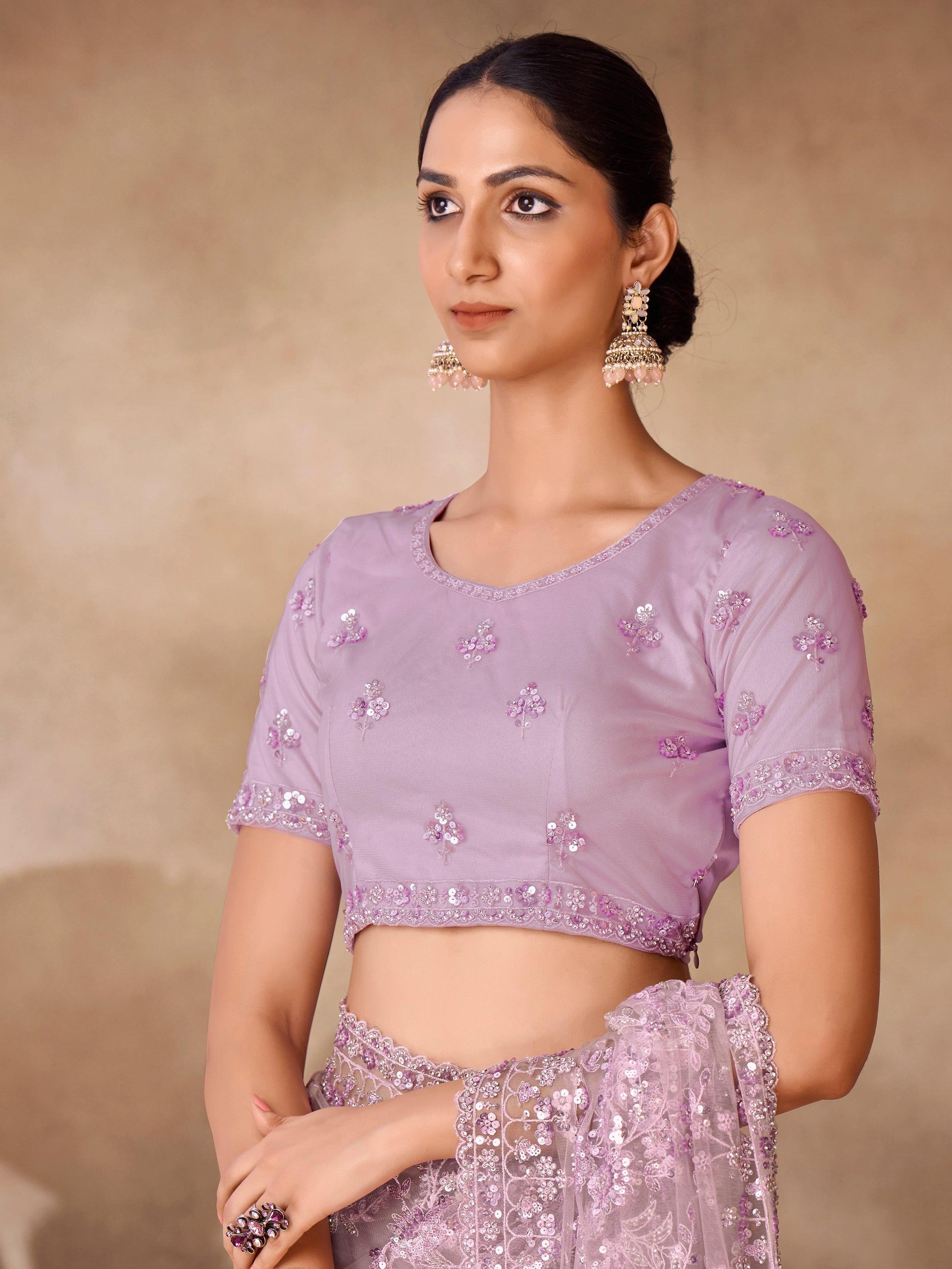 Captivating Lavender Sequins Net Party Wear Saree With Blouse