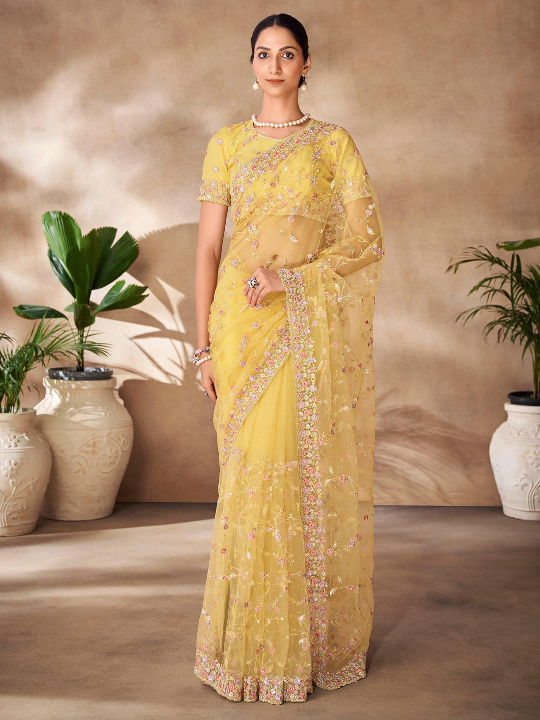 Fascinating Yellow Sequins Net Designer Saree With Blouse