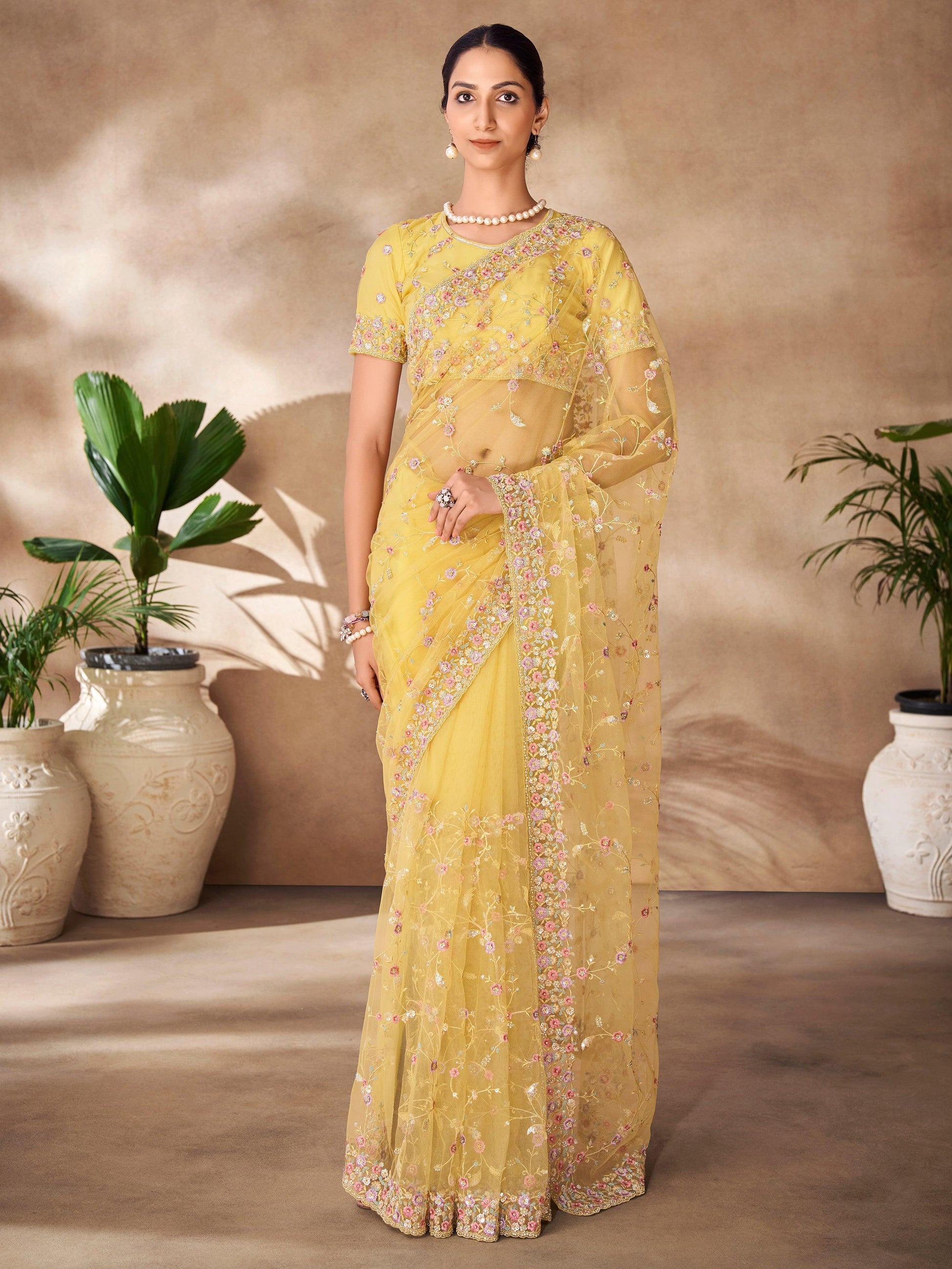 Fascinating Yellow Sequins Net Designer Saree With Blouse