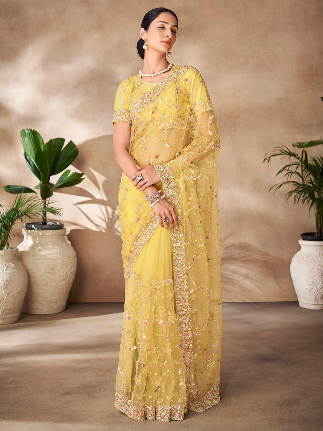 Fascinating Yellow Sequins Net Designer Saree With Blouse