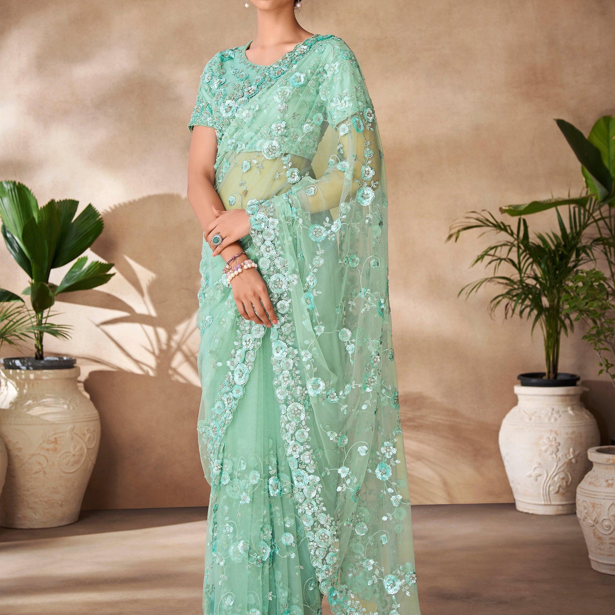 Bewitching Mint Green Sequins Net Designer Saree With Blouse