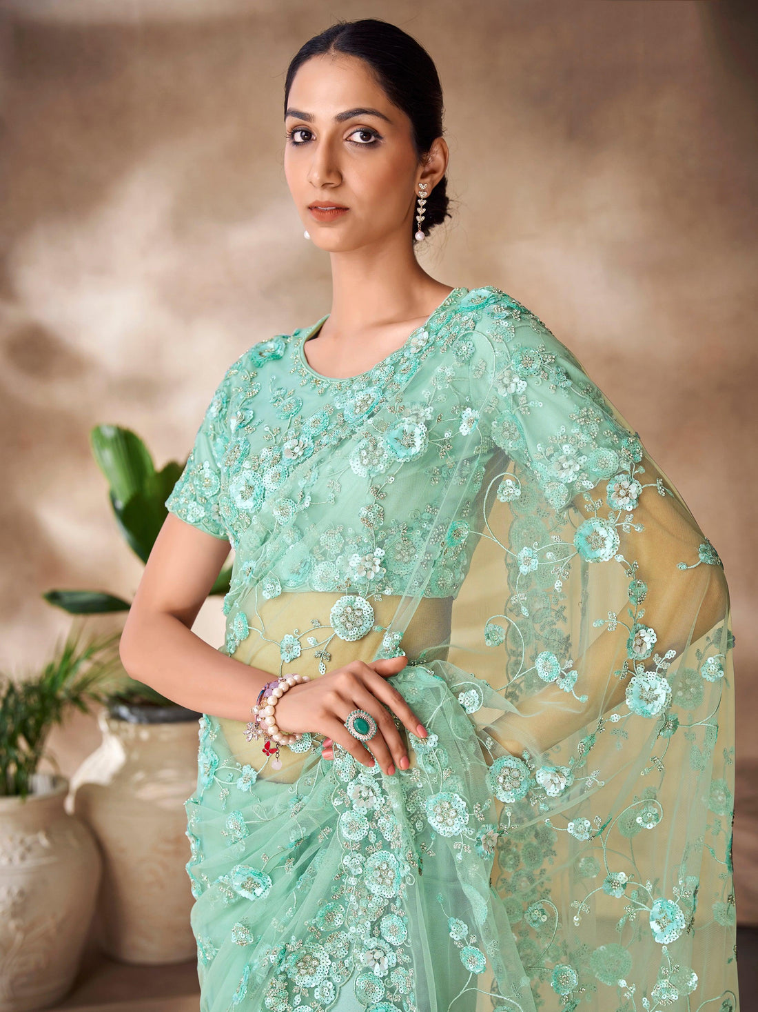 Bewitching Mint Green Sequins Net Designer Saree With Blouse