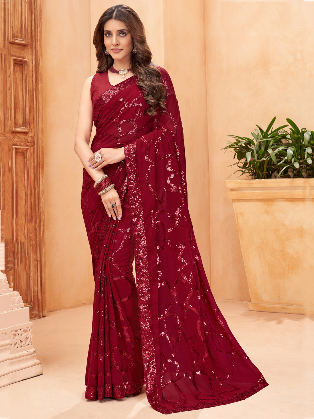 Stunning Maroon Sequins Georgette Party Wear Saree With Blouse