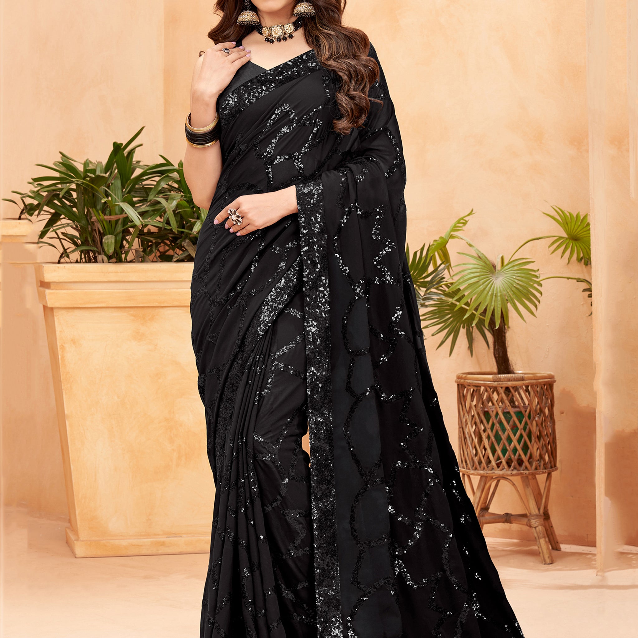 Astonishing Black Sequins Georgette Reception Wear Saree