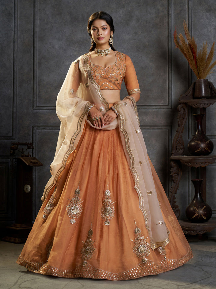 Graceful Peach Zari Embroidered Organza Traditional Lehenga Choli