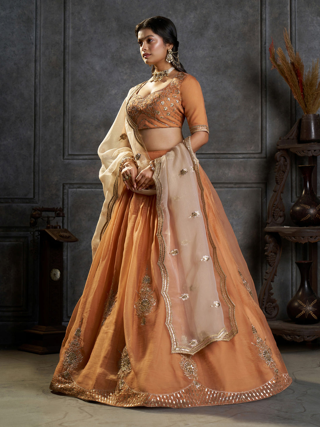 Graceful Peach Zari Embroidered Organza Traditional Lehenga Choli